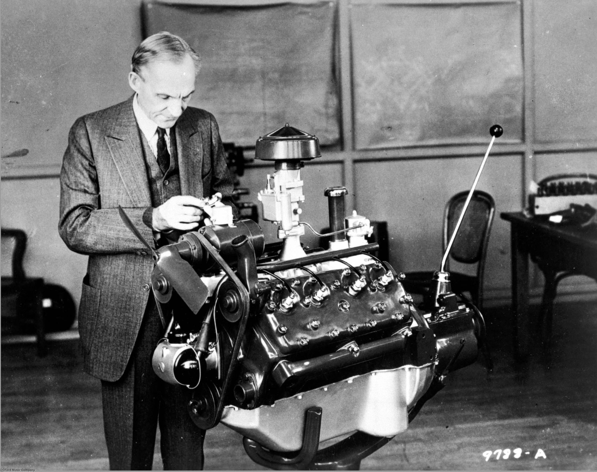 Henry Ford Looking at V-8 engine